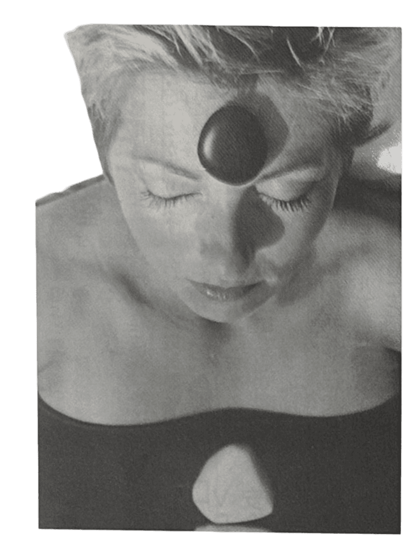 Article image of woman with hot stone on her forehead